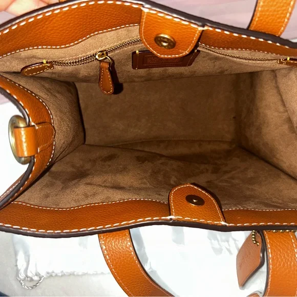 Coach Brown and Cream Tote Bag that is the sun that is casting spots on the bag - Picture 4 of 7